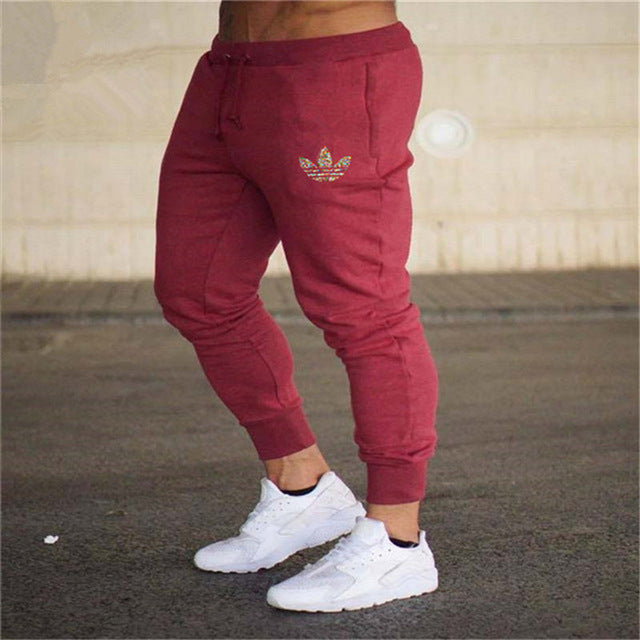 New Brand Print logo Gyms Men Joggers Casual Men Sweatpants Joggers Pantalon Homme Trousers Sporting Clothing Bodybuilding Pants