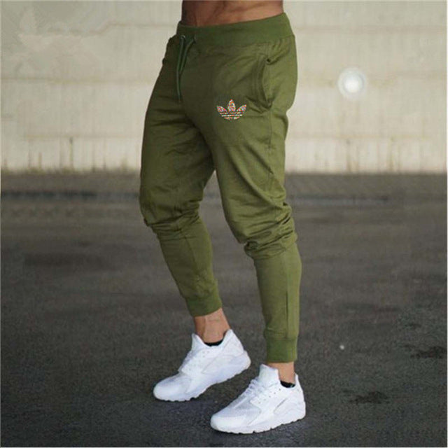New Brand Print logo Gyms Men Joggers Casual Men Sweatpants Joggers Pantalon Homme Trousers Sporting Clothing Bodybuilding Pants