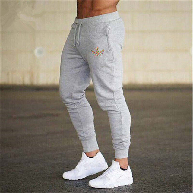 New Brand Print logo Gyms Men Joggers Casual Men Sweatpants Joggers Pantalon Homme Trousers Sporting Clothing Bodybuilding Pants