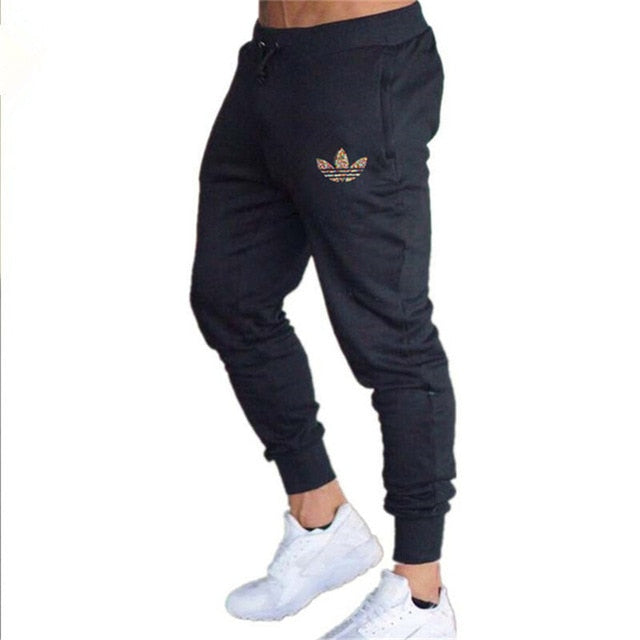 New Brand Print logo Gyms Men Joggers Casual Men Sweatpants Joggers Pantalon Homme Trousers Sporting Clothing Bodybuilding Pants