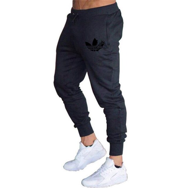 New Brand Print logo Gyms Men Joggers Casual Men Sweatpants Joggers Pantalon Homme Trousers Sporting Clothing Bodybuilding Pants