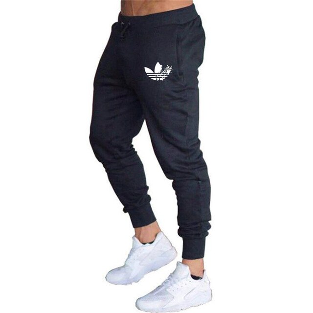 New Brand Print logo Gyms Men Joggers Casual Men Sweatpants Joggers Pantalon Homme Trousers Sporting Clothing Bodybuilding Pants