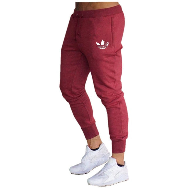 New Brand Print logo Gyms Men Joggers Casual Men Sweatpants Joggers Pantalon Homme Trousers Sporting Clothing Bodybuilding Pants