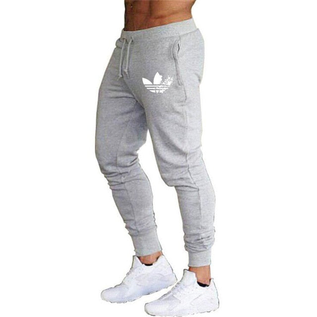New Brand Print logo Gyms Men Joggers Casual Men Sweatpants Joggers Pantalon Homme Trousers Sporting Clothing Bodybuilding Pants